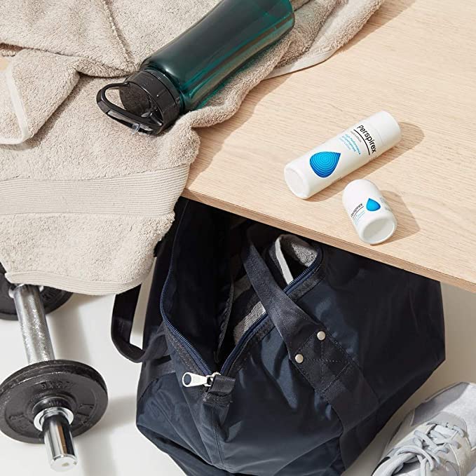 PERSPIREX roll-on in a toiletry bag lifestyle scene offering discreet sweat control on-the-go