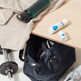 PERSPIREX roll-on in a toiletry bag lifestyle scene offering discreet sweat control on-the-go