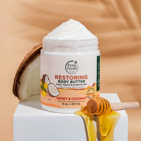 Petal Fresh applying butter from jar to skin demonstrating smooth absorption benefit