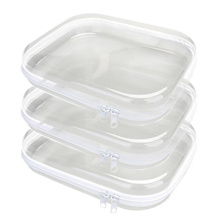 PGAXM front view of three clear hard zipper pouches showing sizes and shape, easy organization