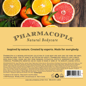 Pharmacopia bottle next to 16 oz glass showing true product size