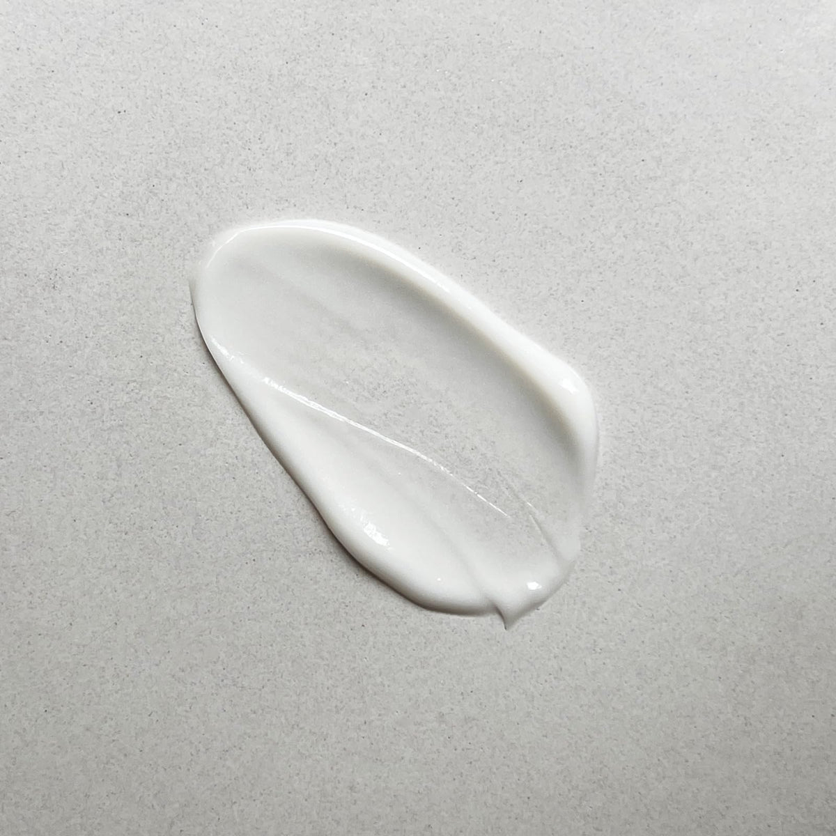 Pharmacopia close-up of lotion texture highlighting creamy non-greasy finish benefits