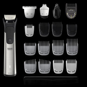 Philips Multigroom held in hand showing size and scale for easy handling