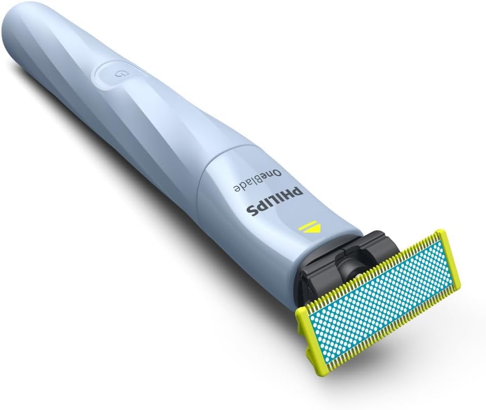 PHILIPS OneBlade held in hand showing travel-friendly size and convenience benefit