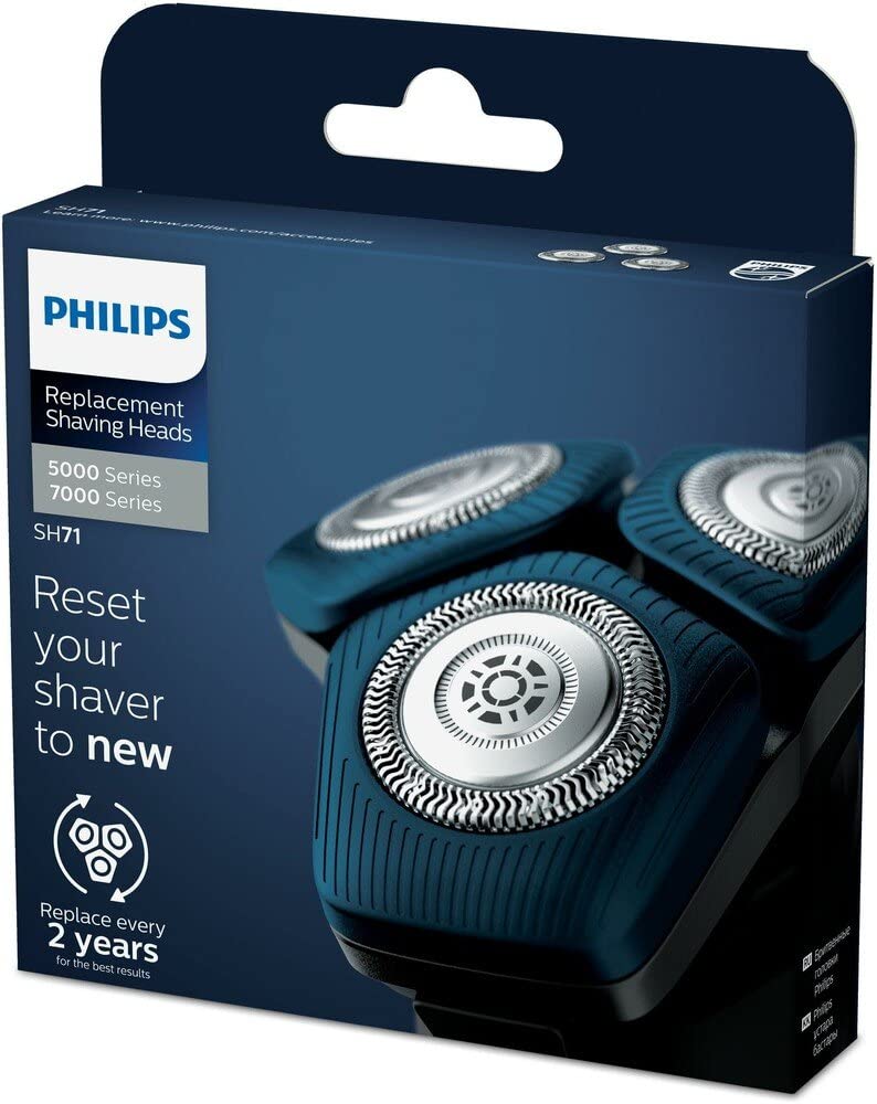 PHILIPS replacement heads held in hand showing scale and quick tool-free swap benefit