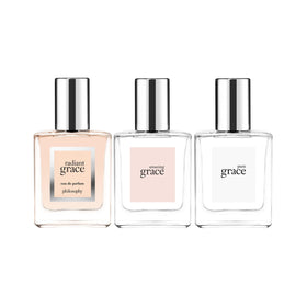 philosophy three 0.5 oz grace bottles lined up, visually comparing fragrance variations