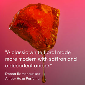 PHLUR Amber Haze hair spritz in use illustrating light scenting without buildup