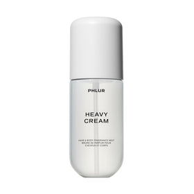 PHLUR Heavy Cream front bottle shot showing elegant label and travel-friendly size
