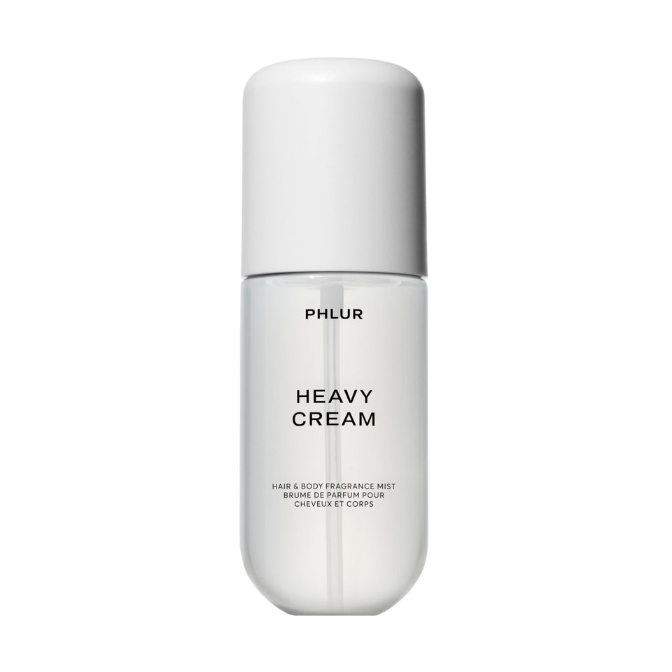 PHLUR Heavy Cream front bottle shot showing elegant label and travel-friendly size