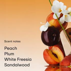PHLUR close-up label detail of Peach Skin notes benefit: readable fragrance information