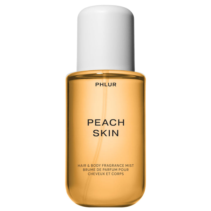 PHLUR front bottle showing Peach Skin label and elegant packaging benefit: clear product identity