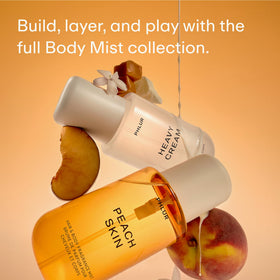 PHLUR bottle held in hand for scale demonstrating 8 fl oz size benefit: travel-friendly volume