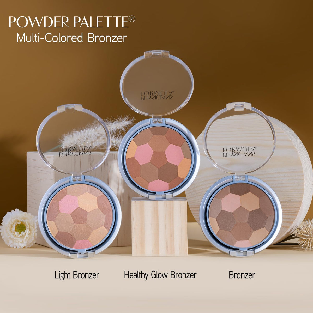 Physicians Formula compact next to everyday items showing travel-friendly size