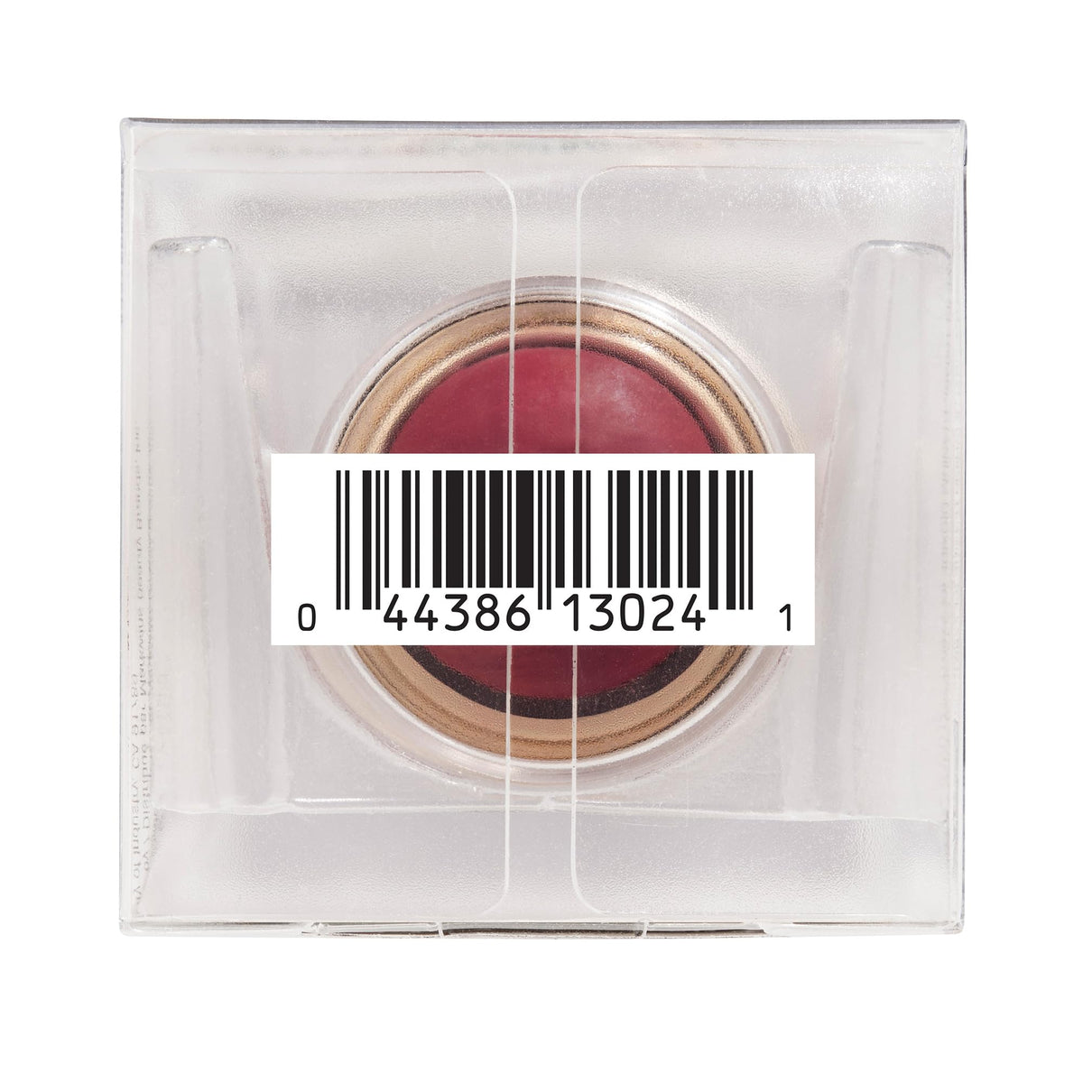 Physicians Formula stick beside coin for scale showing compact travel-ready size and convenience