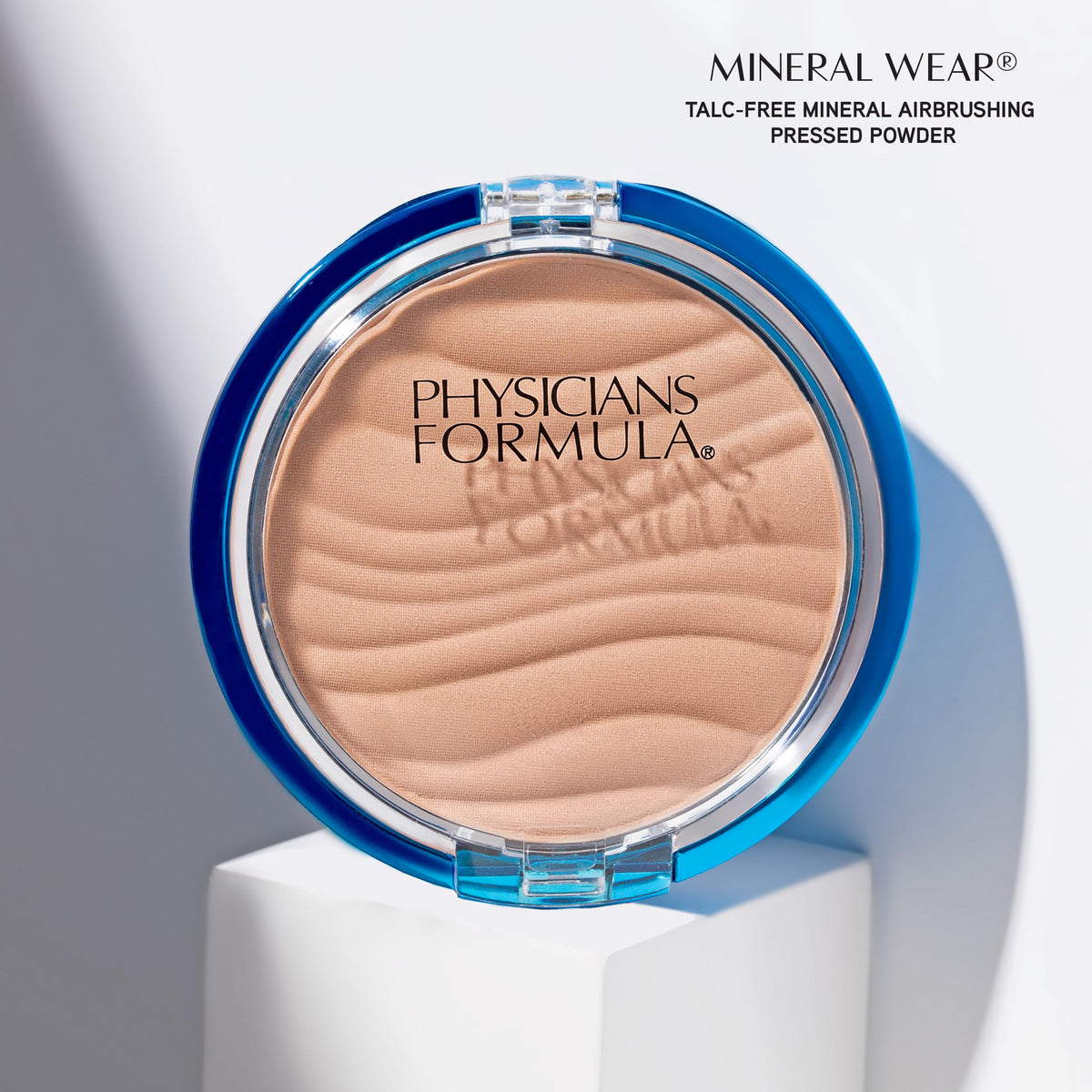 Physicians Formula open compact with mirror showing travel-ready design and product