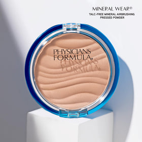 Physicians Formula open compact with mirror showing travel-ready design and product