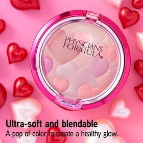 Physicians Formula open pan revealing silky powder texture and mixed tones for smooth blending