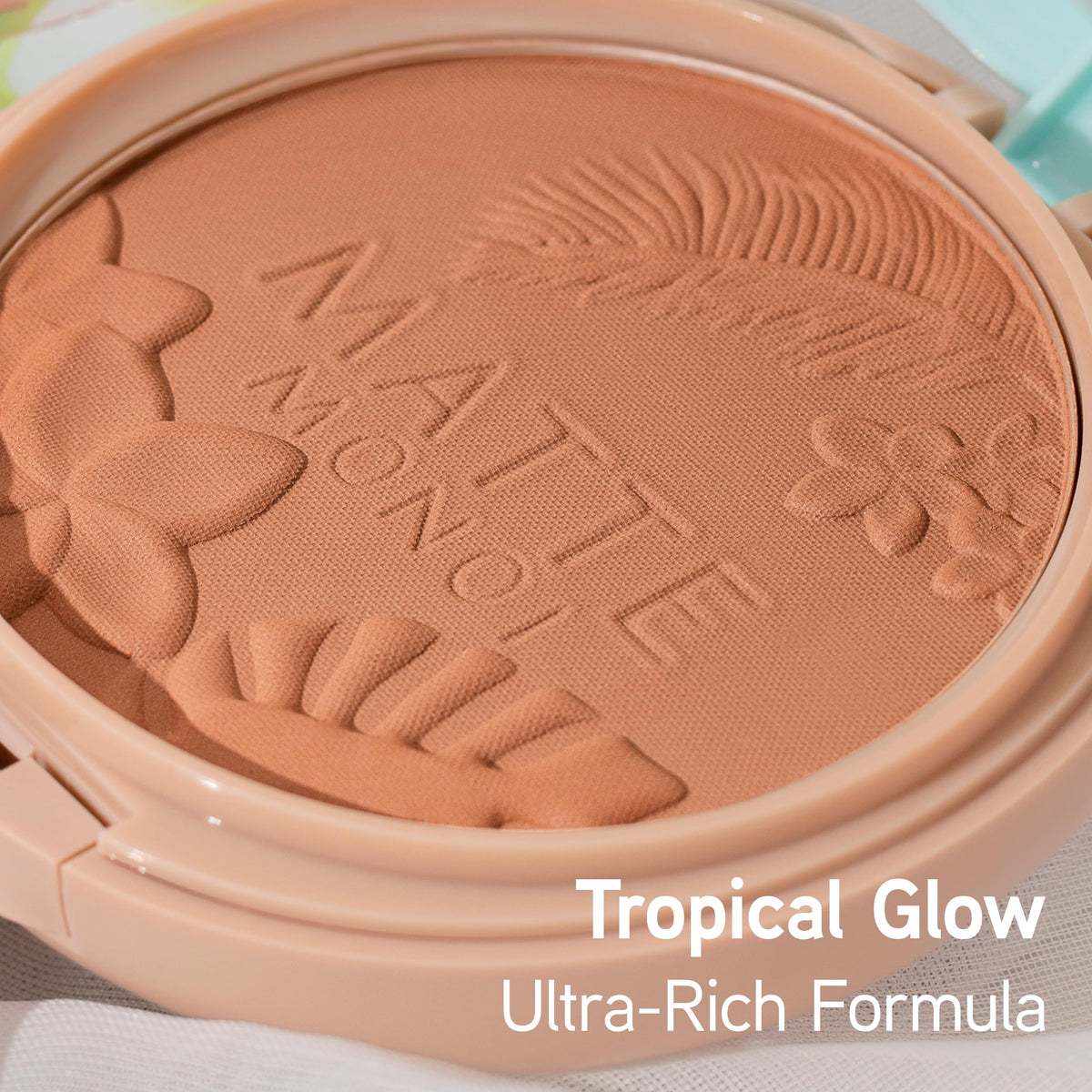 Physicians Formula pan detail highlighting finely milled powder and soft finish