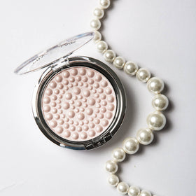 Physicians Formula swatch on skin showing even luminous finish and natural-looking glow