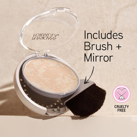 Physicians Formula sponge applying powder to cheek for gentle coverage