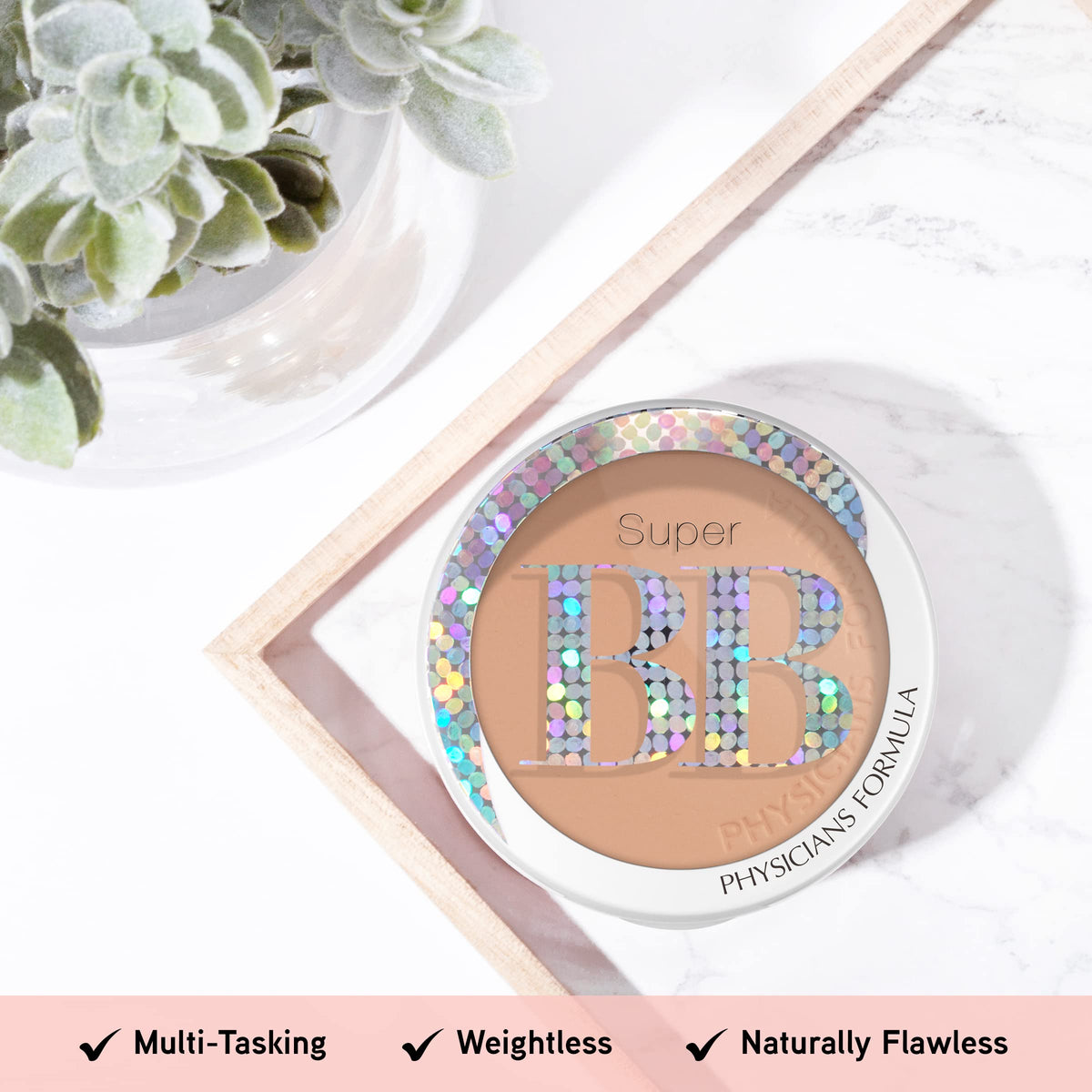Physicians Formula powder being applied with brush for even, natural result