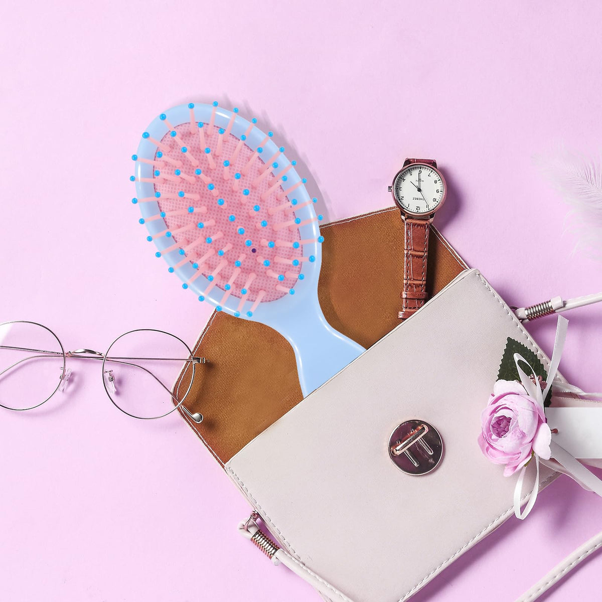 Phyyixs travel purse styling showing brush ready for touch-ups while traveling