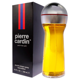 Pierre Cardin bottle in evening setting suggesting romantic, wearable warmth