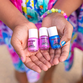 Piggy Paint application on child's hands, highlighting non-toxic, family-friendly use