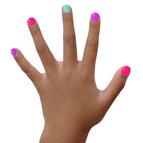 Piggy Paint brush applying polish on a child’s nail for smooth coverage