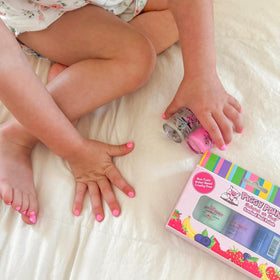 Piggy Paint being air-dried on nails showing quick, low-odor benefit