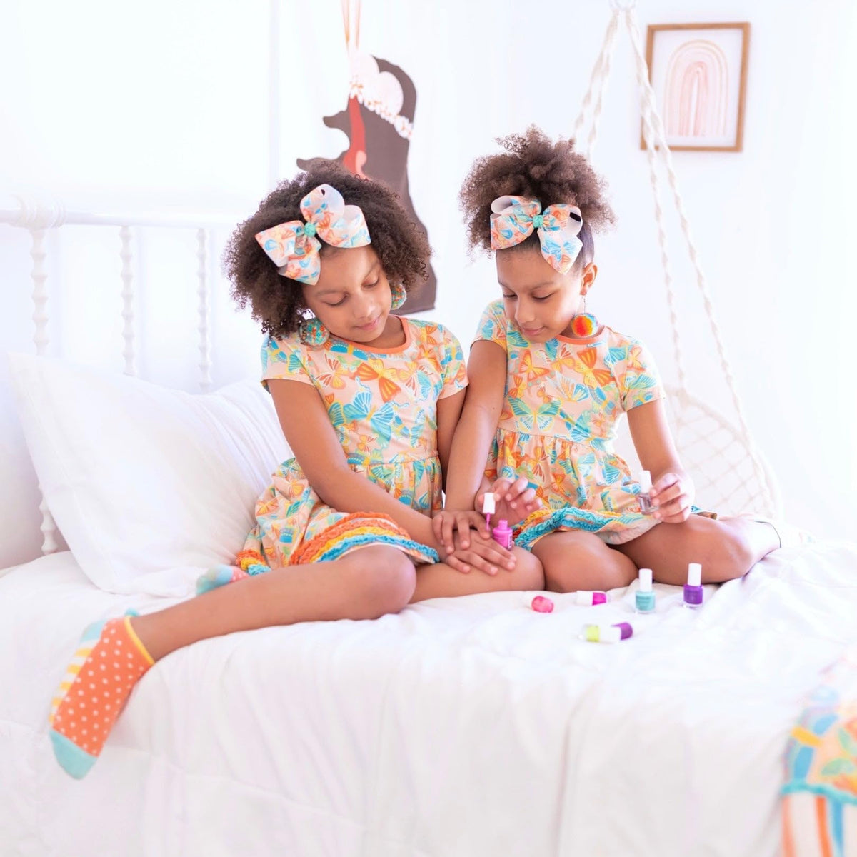Piggy Paint family mani lifestyle scene with kids and caregiver enjoying safe polish