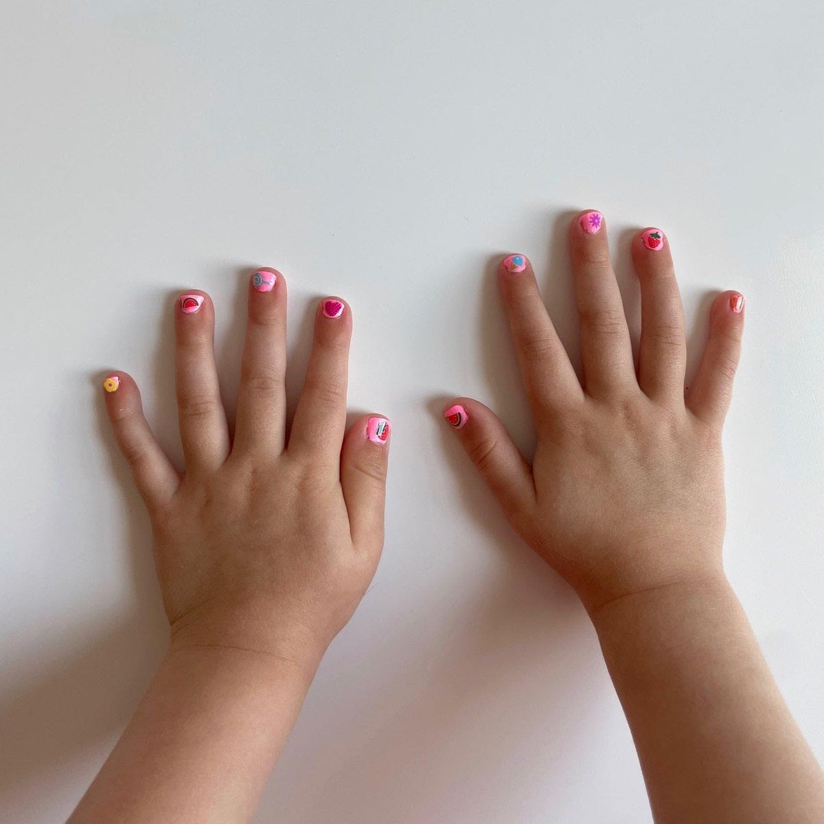 Piggy Paint brush applying polish to nail for smooth coverage