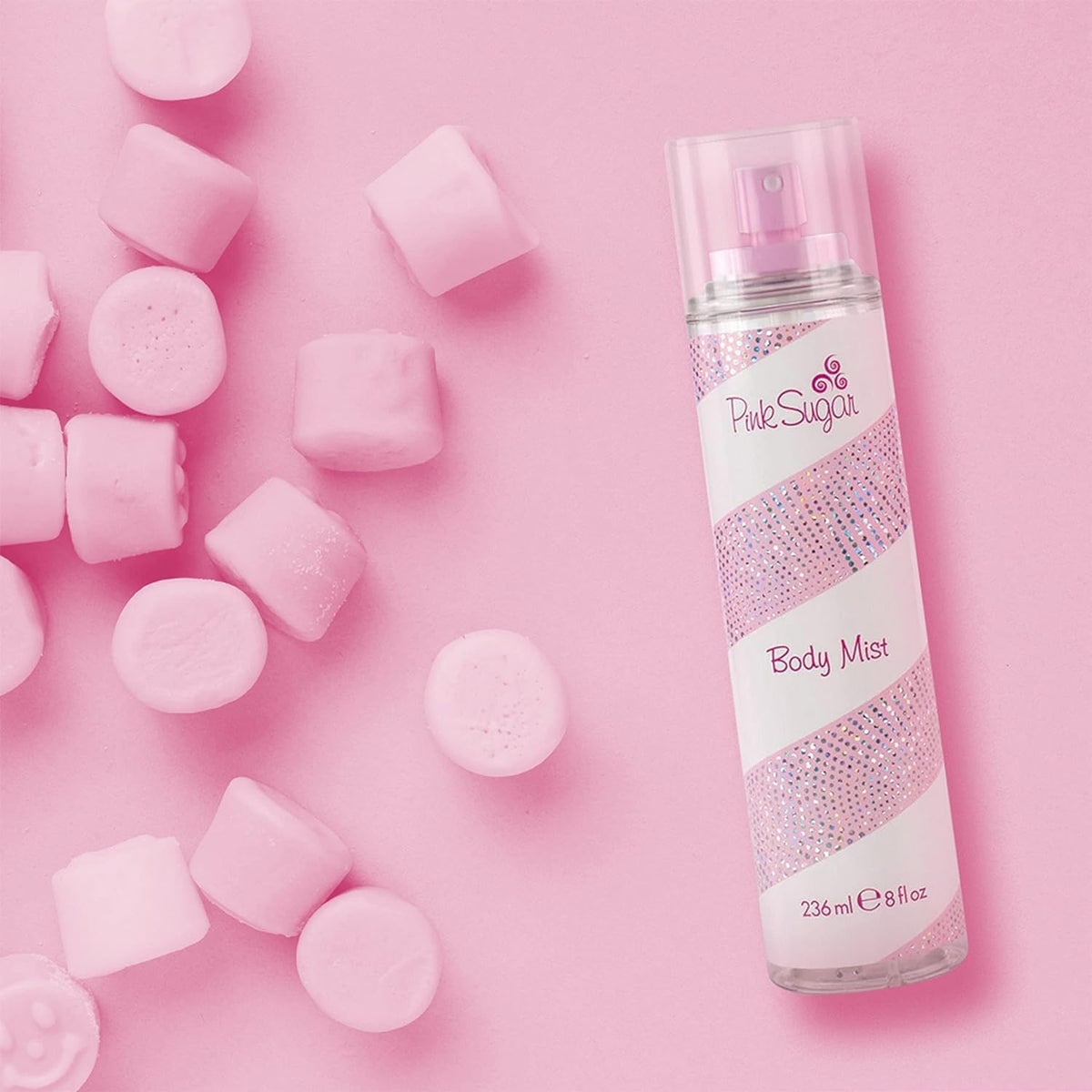 Pink Sugar label and ingredient notes emphasizing fragrance composition benefits