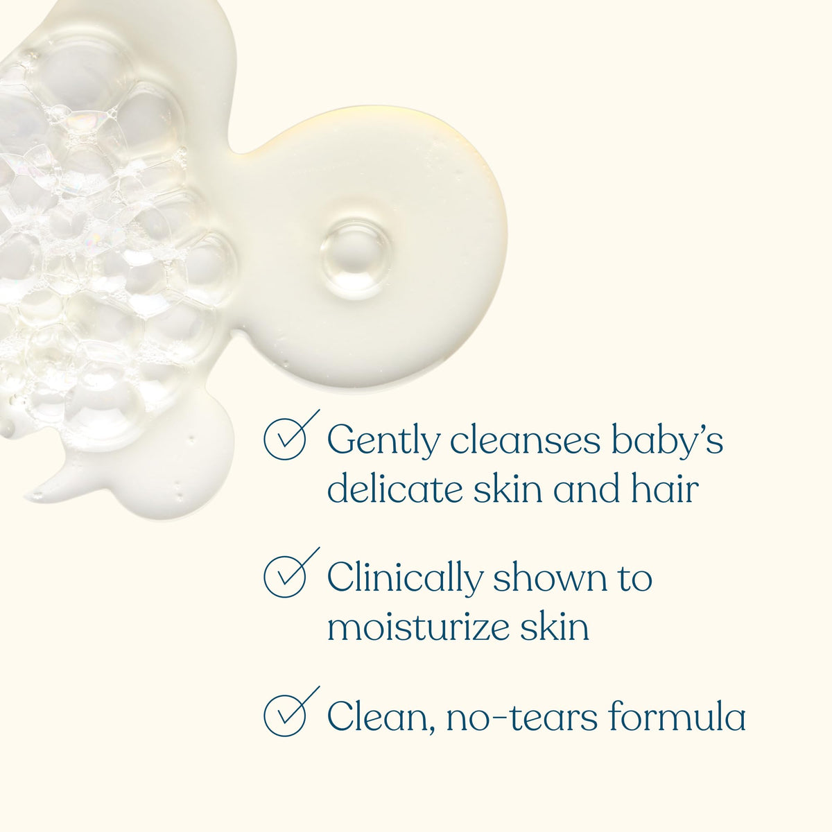 Pipette close-up of creamy lather texture illustrating mild, tear-free foam and hydration