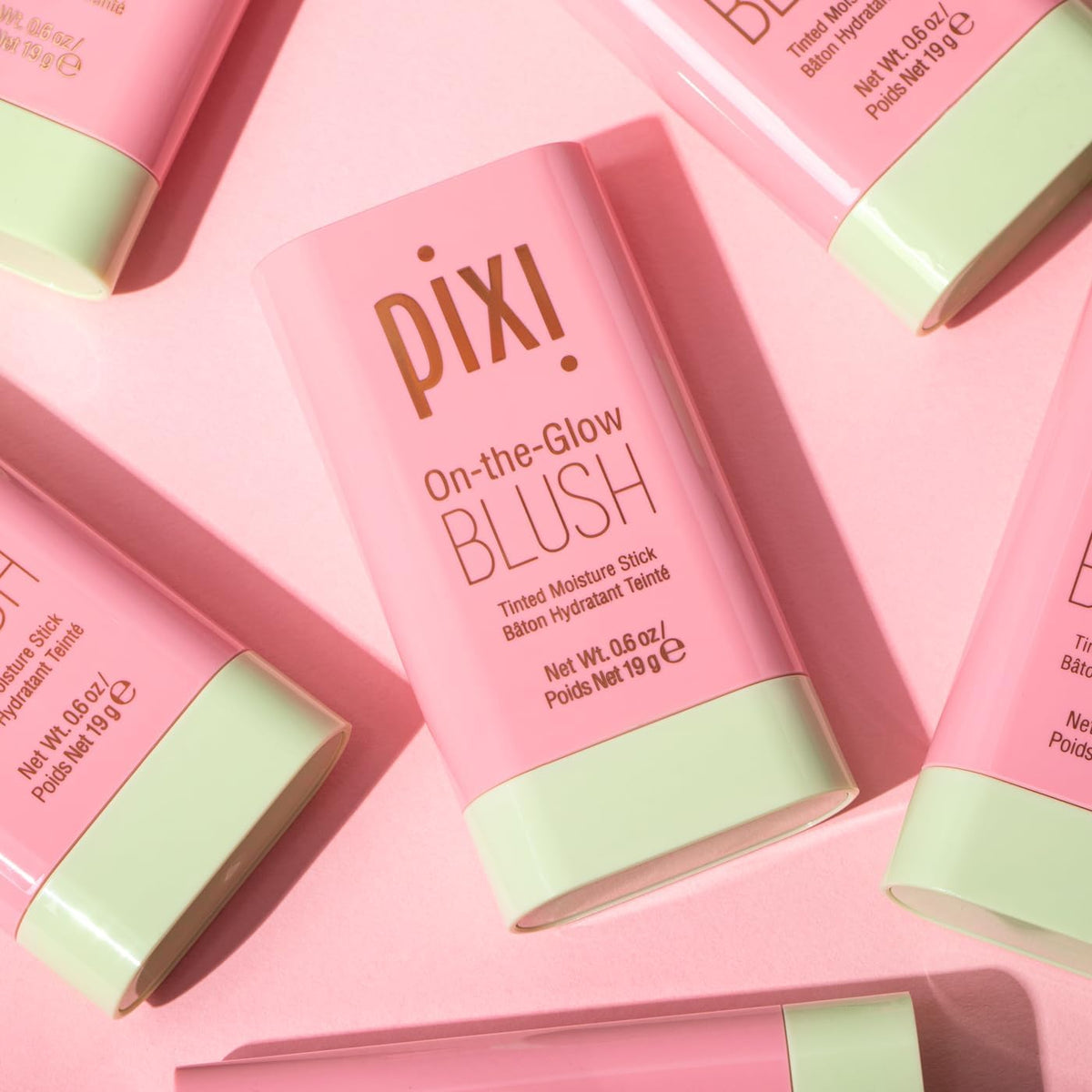 Pixi using the stick on lips to create a coordinated tint