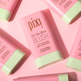Pixi using the stick on lips to create a coordinated tint
