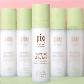 Pixi Milky Mist held in hand during application showing easy use and on-the-go hydration