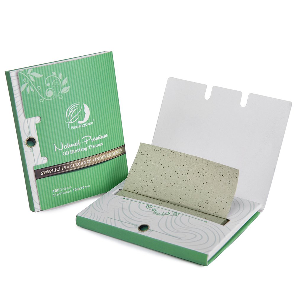 Organic green tea leaves beside PleasingCare sheets, light fresh scent and natural freshness