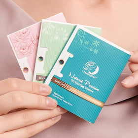 PleasingCare sheet in hand blotting nose to remove shine and refresh makeup