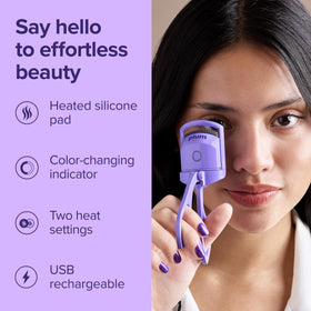 Plum Beauty curler held in hand to show size and portable convenience benefit