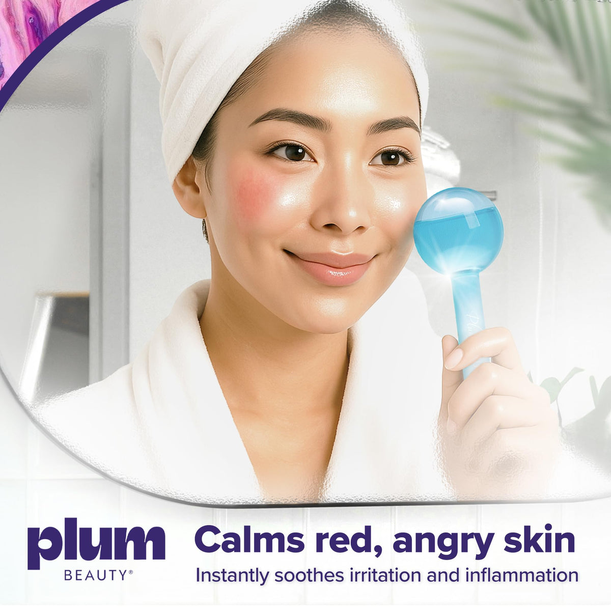 Plum Beauty globe held in hand showing scale and ergonomic grip for controlled massage