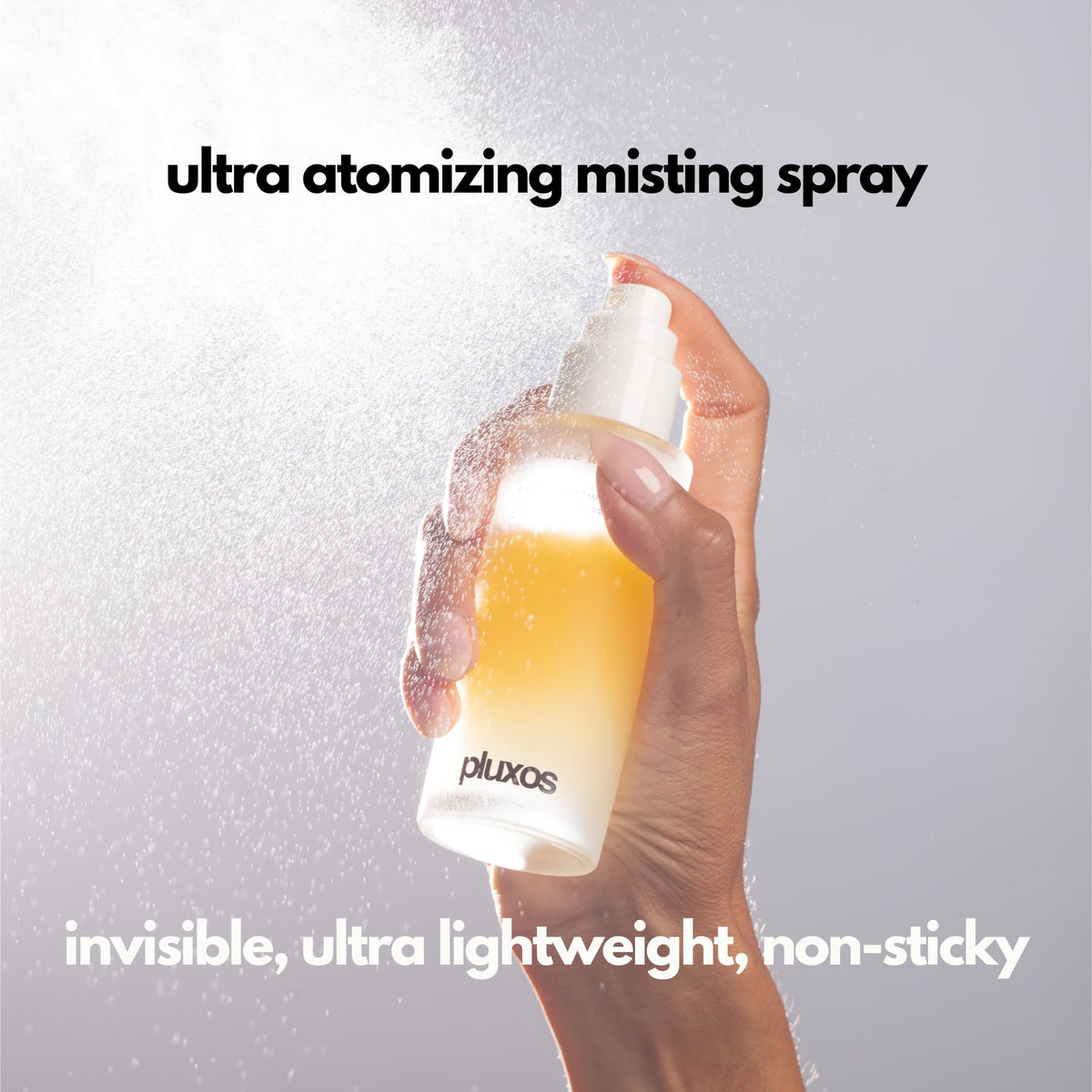 PLUXOS being sprayed over makeup to refresh SPF without disturbing cosmetics