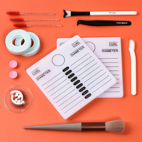 POCMKO brushes arranged on salon tray showing professional presentation and convenience