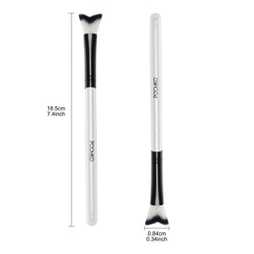 POCMKO brush next to hand and ruler illustrating 7.4 inch size for easy handling