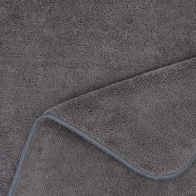 POLYTE towel beside ruler showing 20 x 40 inch size for full hair coverage