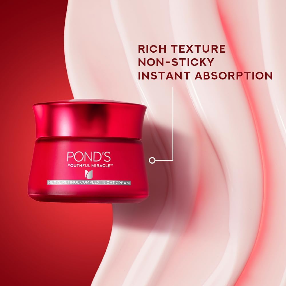 POND'S Age Miracle cream on hand demonstrating lightweight spreadability benefit