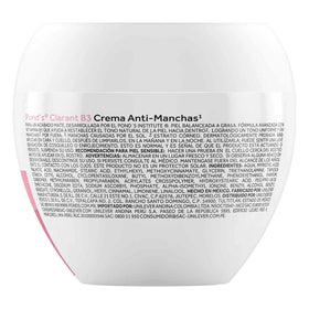 POND'S cream dispensed on hand demonstrating easy spreadability