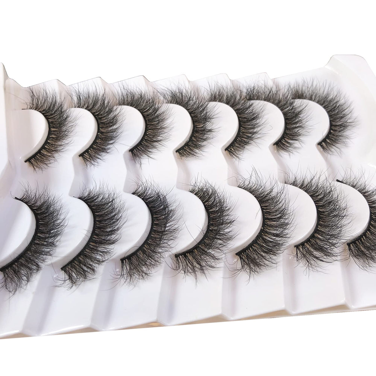 Pooplunch lashes on makeup table showing easy styling and daily use benefit
