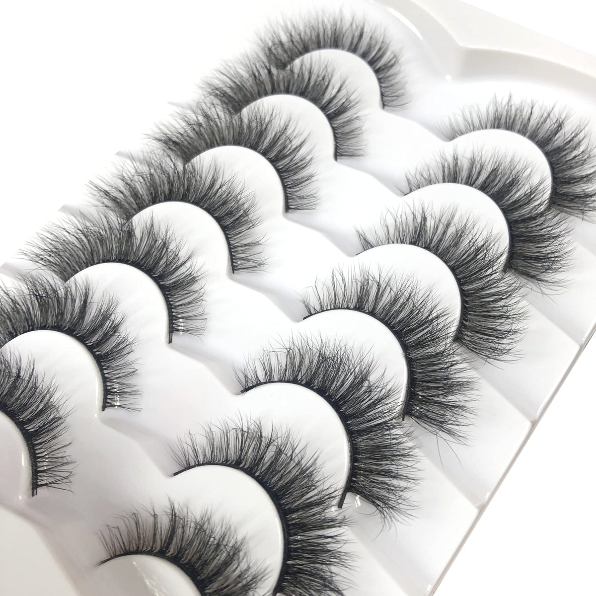 Pooplunch lashes applied on eye model showing cat eye lift and subtle volume