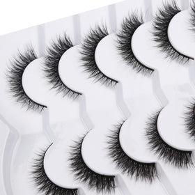 Pooplunch lash pair in hand demonstrating size and scale